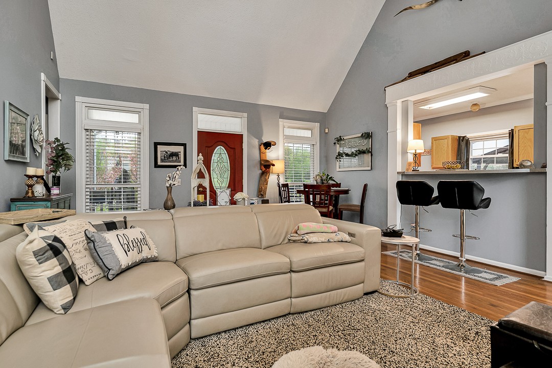 624 Faith-Rae Boulevard Morrison, TN 37357 - Photo 7 of 38 a living room with furniture a rug kitchen view and a window
