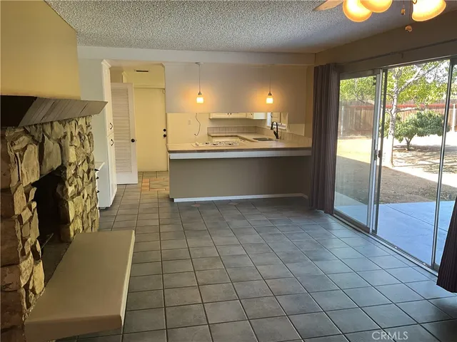 a view of a refrigerator and window