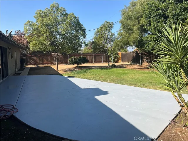 a view of a back yard of the house