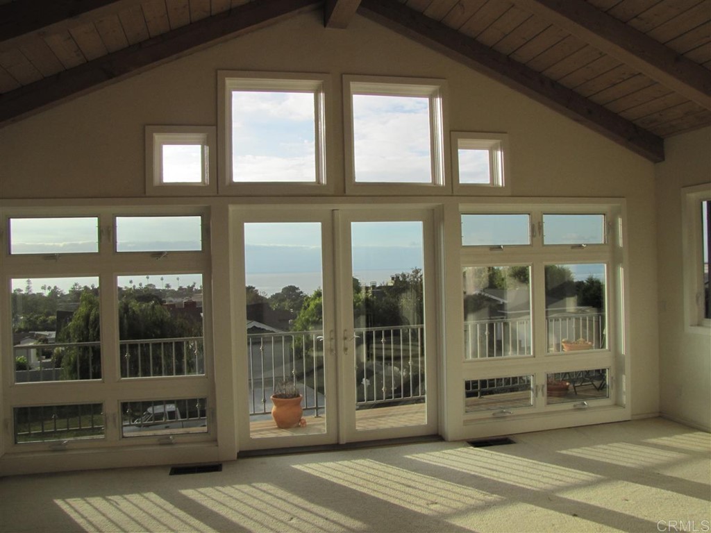 a view of a building with a glass door
