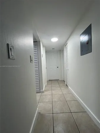 a kitchen with stainless steel appliances a stove and a refrigerator
