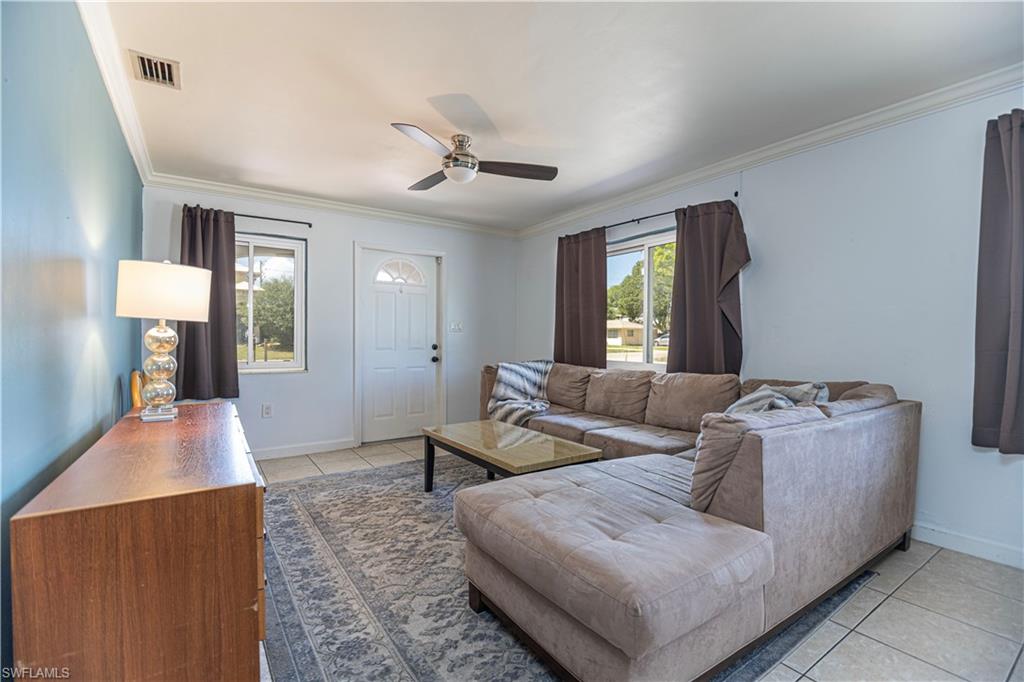 1003 Trail Terrace Drive Naples, FL 34103 - Photo 16 of 23 a living room with furniture and window