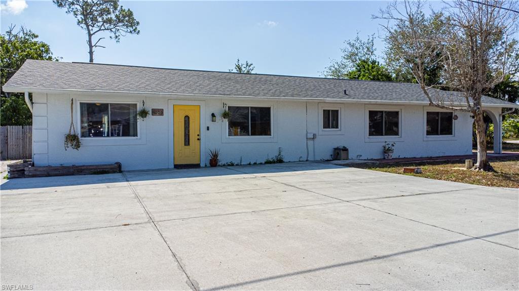 1003 Trail Terrace Drive Naples, FL 34103 - Photo 3 of 23 a house view with a outdoor space