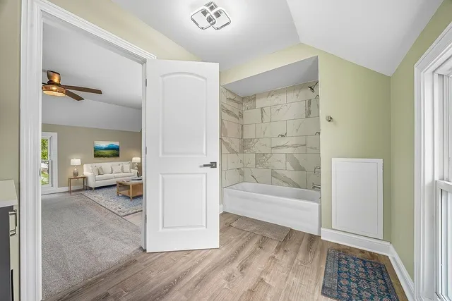 a view of a living room and hardwood floor