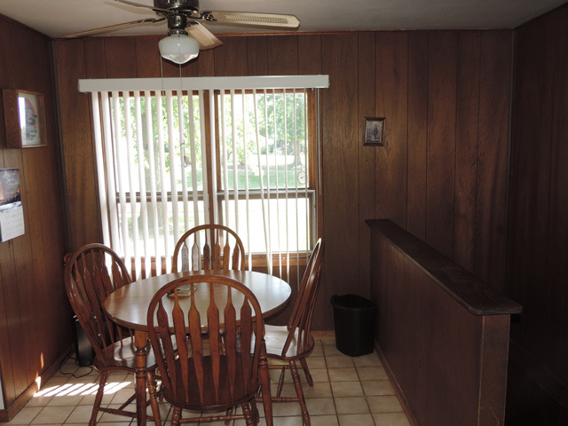 106 Thornton Street Lockport, IL 60441 - Photo 3 of 9 a view of a dining room with furniture window and outside view