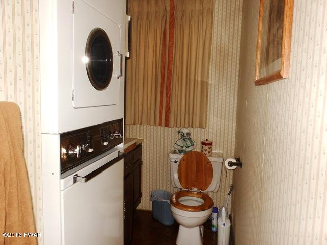 260 Dorys Road Dingmans Ferry, PA 18328 - Photo 33 of 44 laundry and half bath