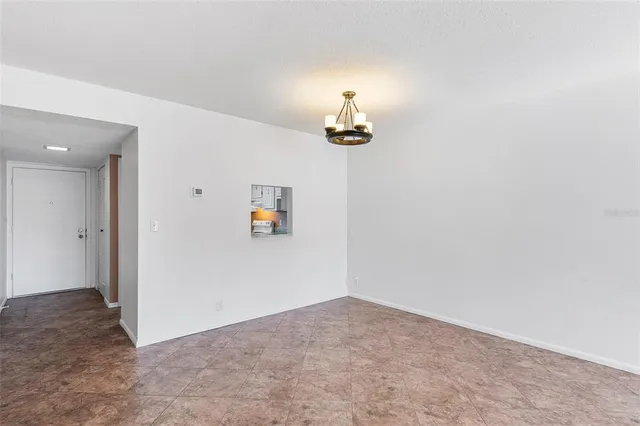 a view of a hallway with closet