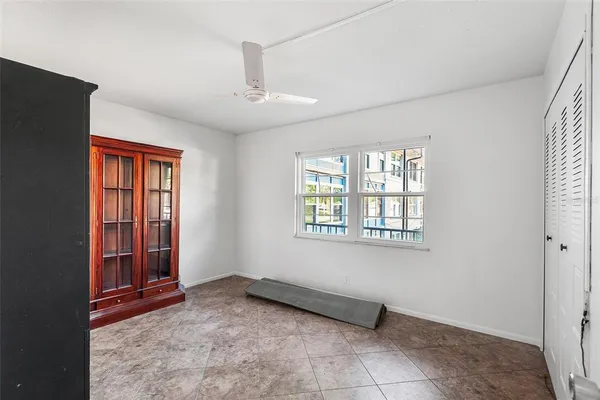 a bathroom with a sink toilet a mirror and shower