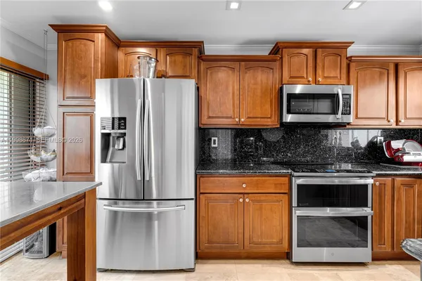$700,000 | 10137 Costa Del Sol Boulevard, Unit A57, Doral, FL 33178