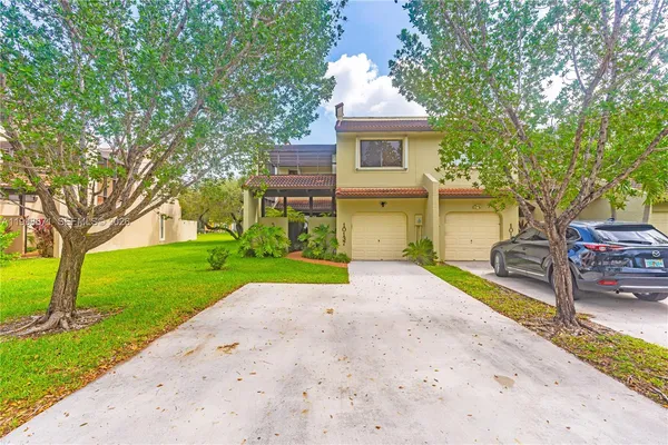 $700,000 | 10137 Costa Del Sol Boulevard, Unit A57, Doral, FL 33178