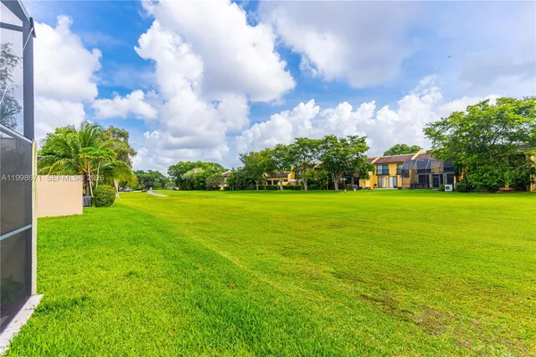 $700,000 | 10137 Costa Del Sol Boulevard, Unit A57, Doral, FL 33178