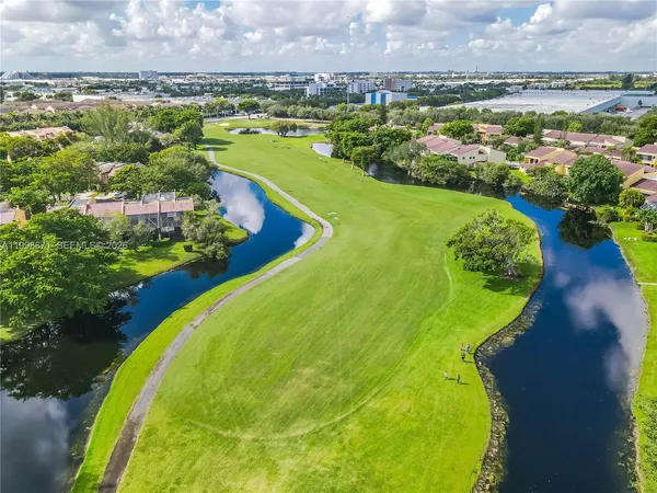 $700,000 | 10137 Costa Del Sol Boulevard, Unit A57, Doral, FL 33178