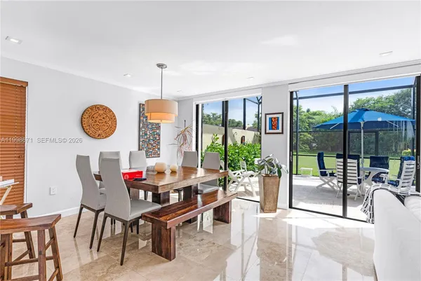 $700,000 | 10137 Costa Del Sol Boulevard, Unit A57, Doral, FL 33178