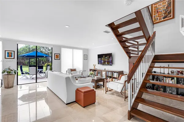 $700,000 | 10137 Costa Del Sol Boulevard, Unit A57, Doral, FL 33178