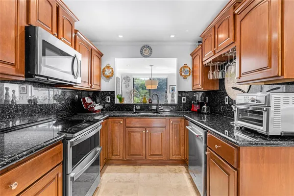 $700,000 | 10137 Costa Del Sol Boulevard, Unit A57, Doral, FL 33178