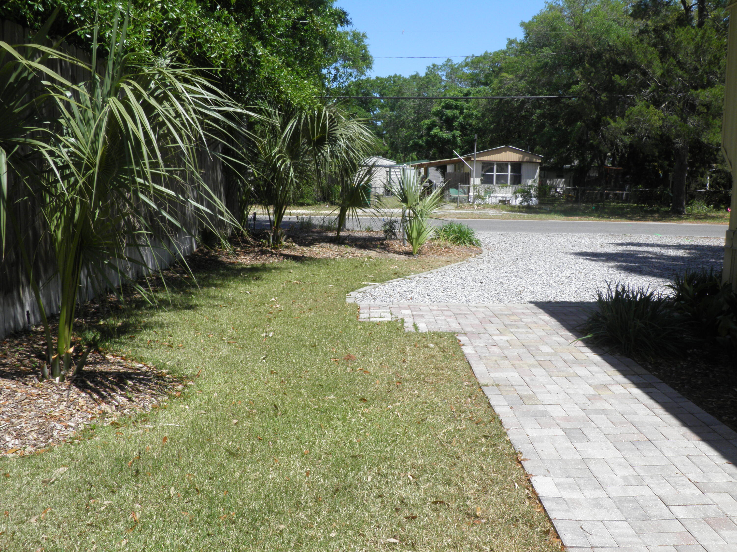 810 Gibson Road Fort Walton Beach, FL 32547 - Photo 31 of 35 Brick walkway to back deck