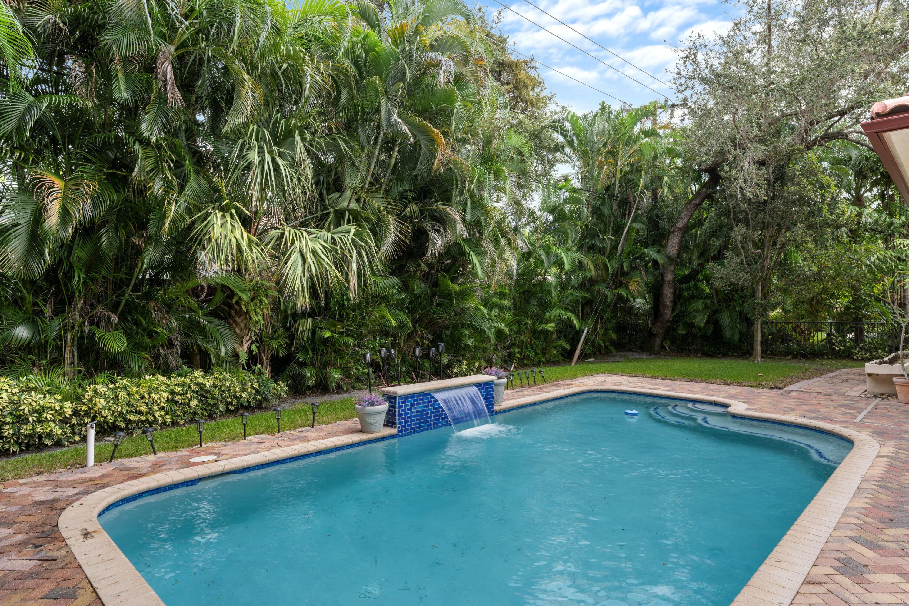 1321 Southwest 16th Street Boca Raton, FL 33486 - Photo 32 of 37 Pool with waterfall