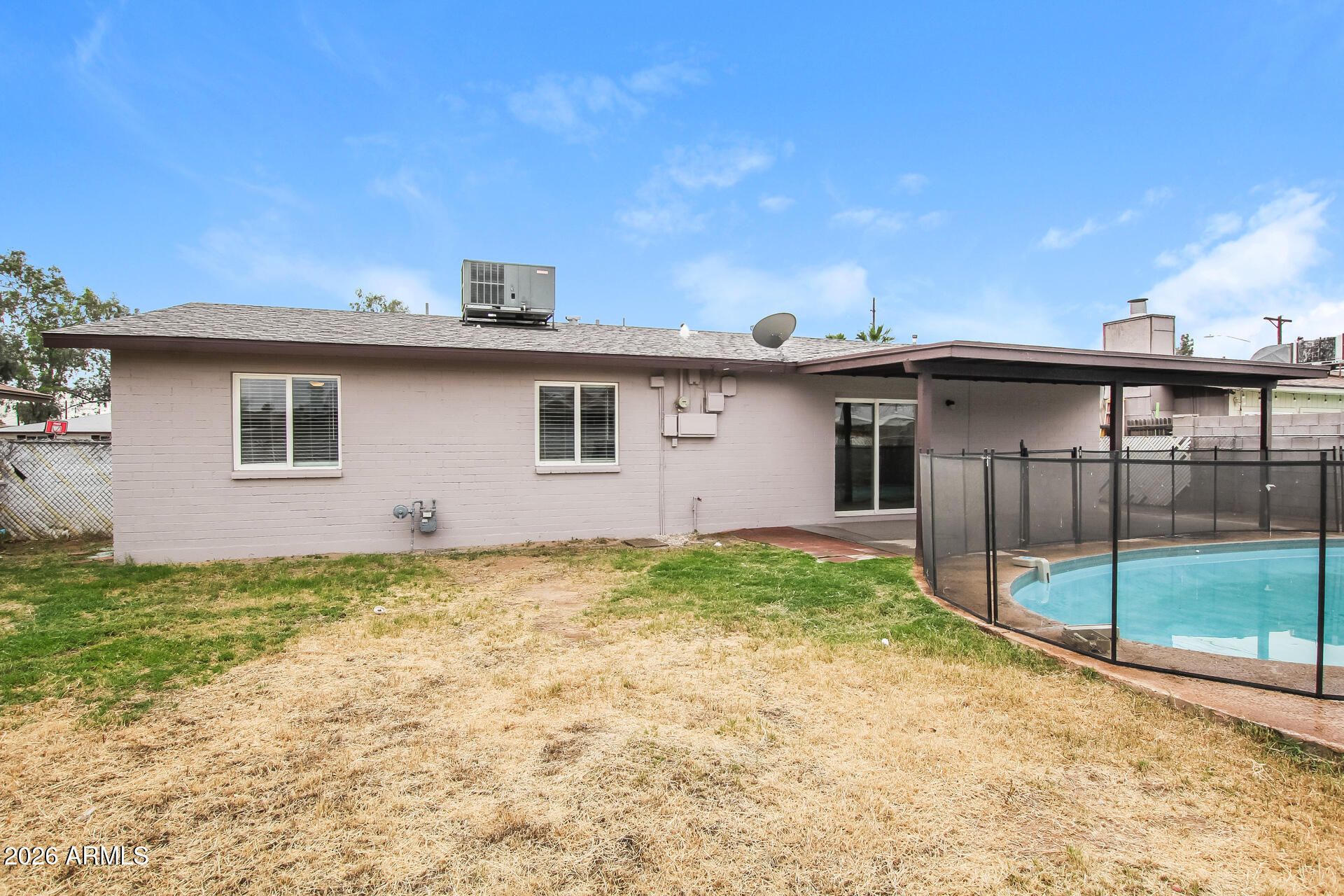 3650 West Berridge Lane Phoenix, AZ 85019 - Photo 3 of 21 a view of a house with backyard and balcony