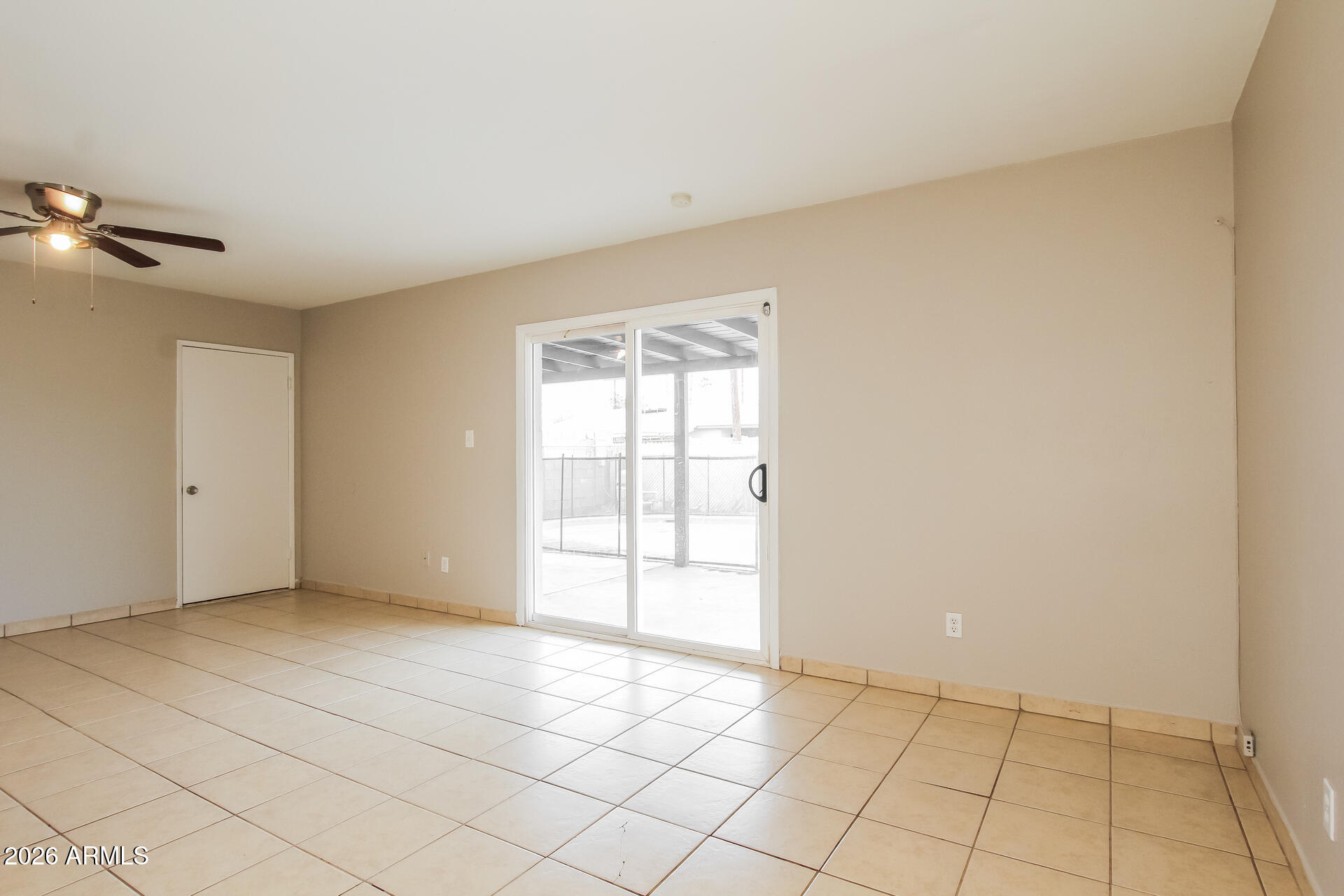 3650 West Berridge Lane Phoenix, AZ 85019 - Photo 8 of 21 an empty room with windows