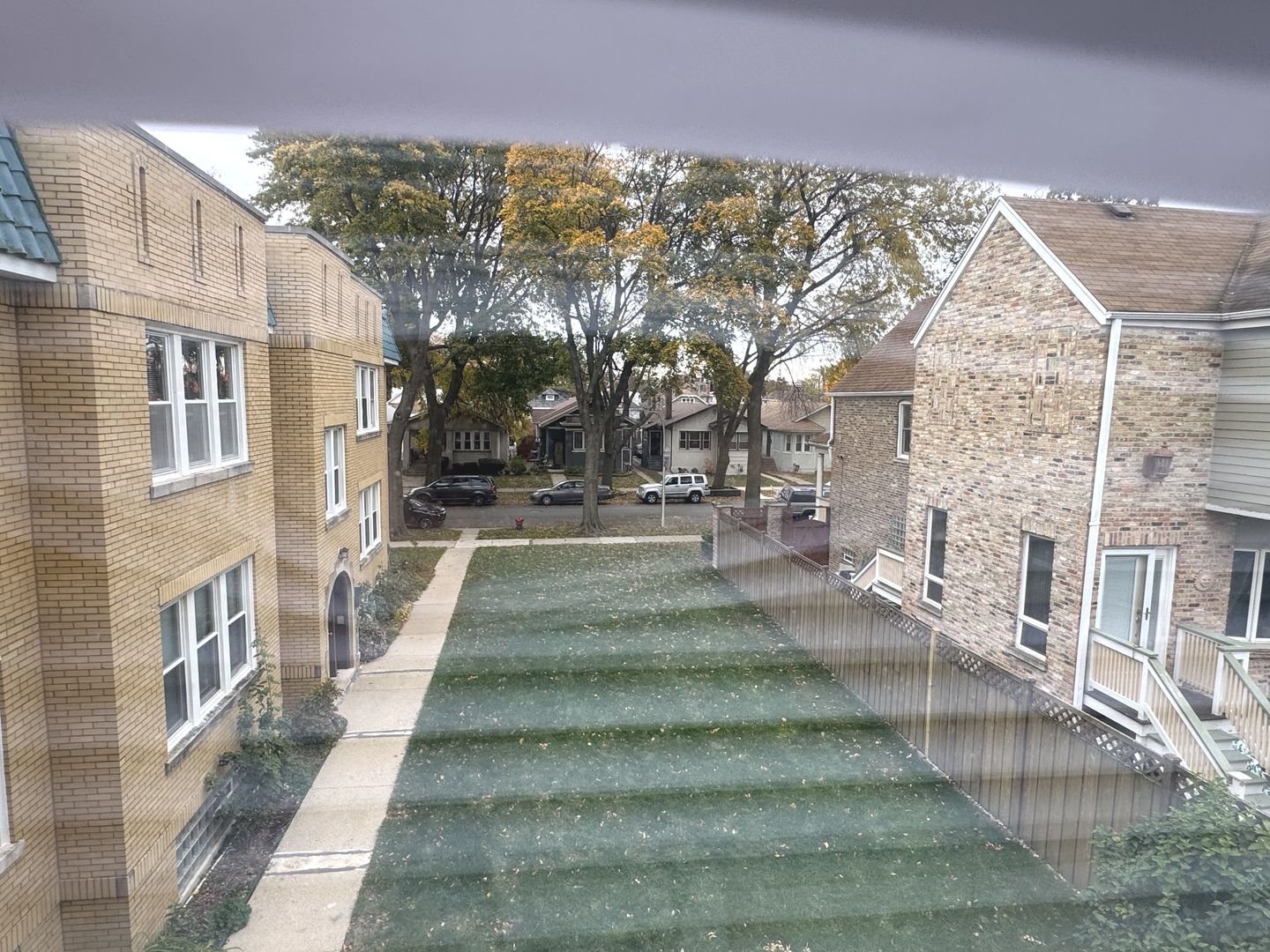 4428 North Laporte Avenue, Unit 2A Chicago, IL 60630 - Photo 6 of 22 a view of yard with large building