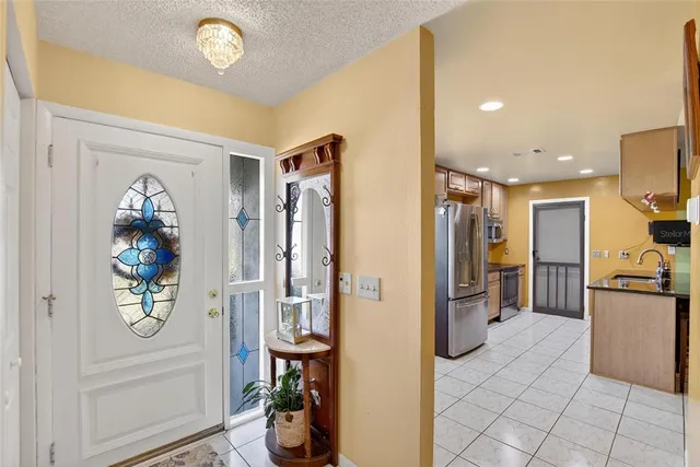 a view of a hallway and a dining room