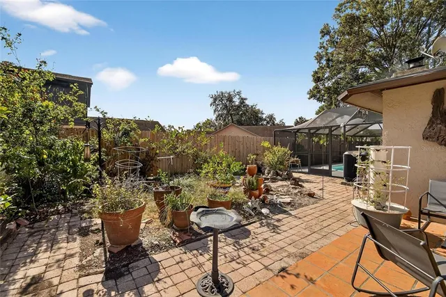a view of a terrace with furniture and a potted plant