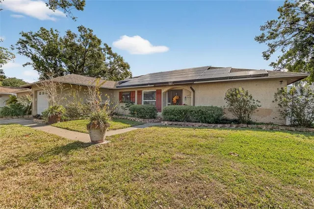 a house view with a outdoor space