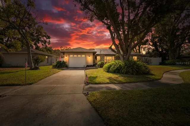 a view of a house with a yard