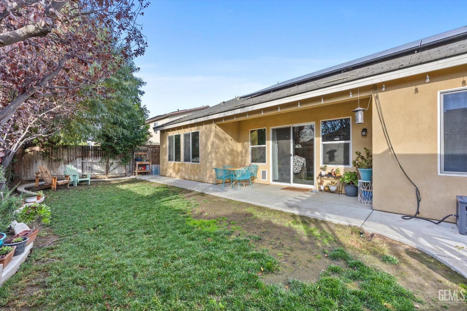 Undisclosed Address Bakersfield, CA 93313 - Photo 26 of 27 a view of a house with backyard and sitting area