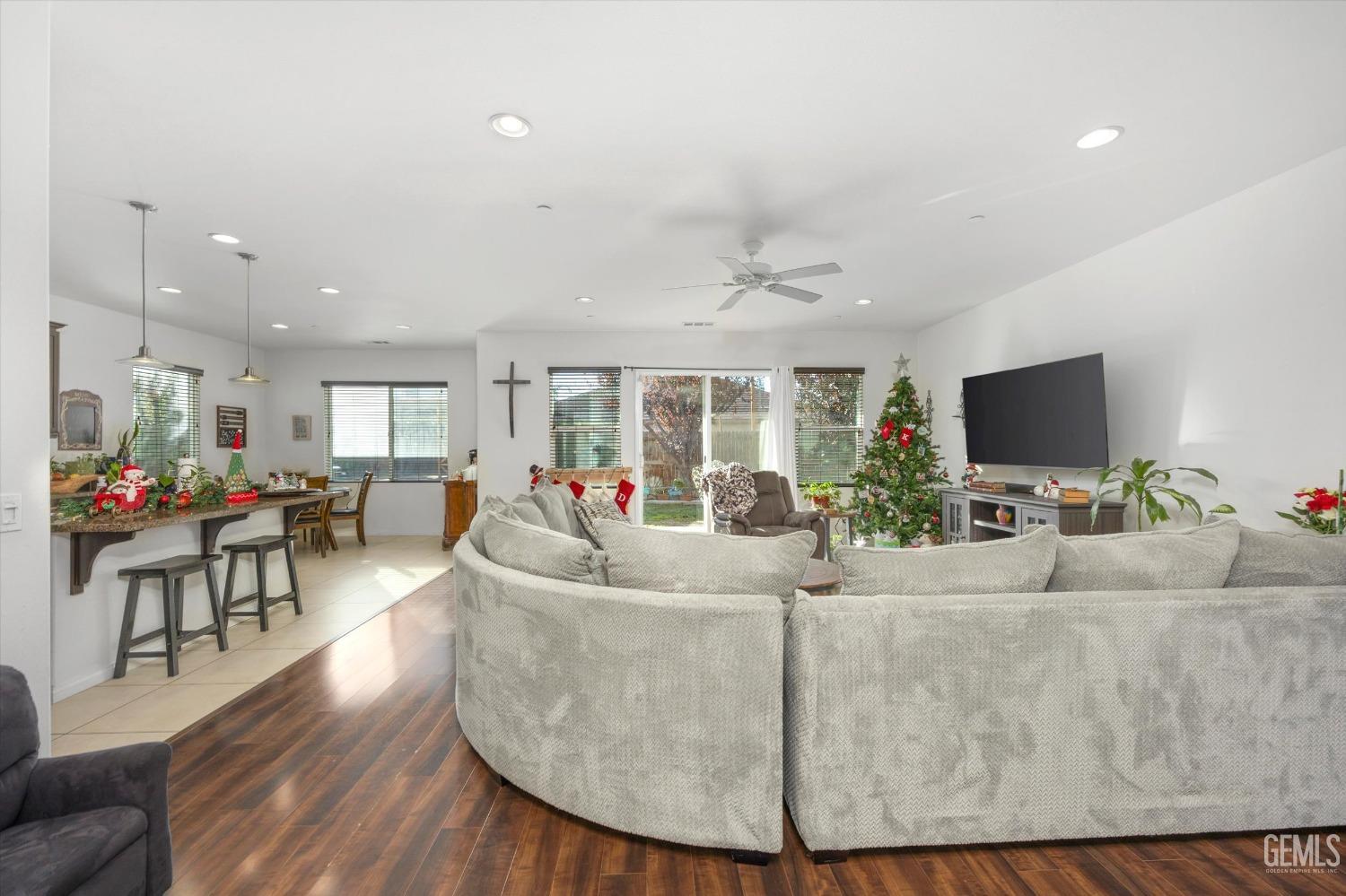 Undisclosed Address Bakersfield, CA 93313 - Photo 5 of 27 a living room with furniture and a flat screen tv
