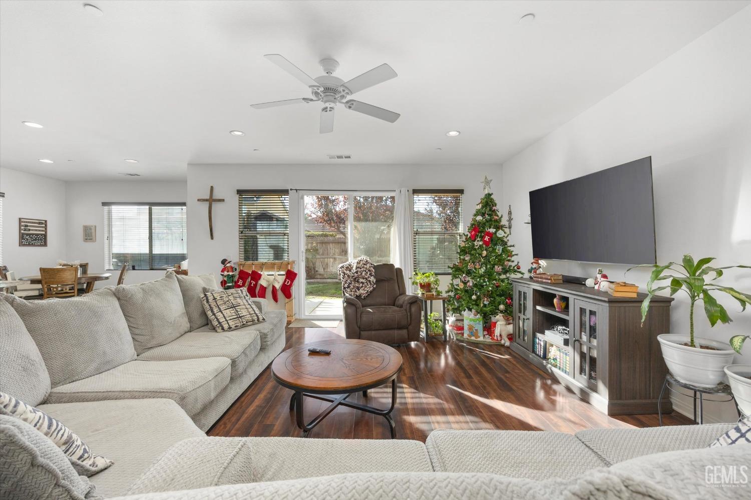 Undisclosed Address Bakersfield, CA 93313 - Photo 7 of 27 a living room with furniture and a flat screen tv