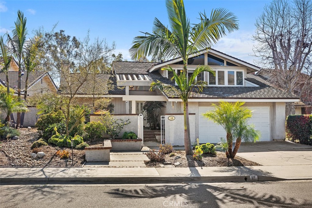 10 Rippling Streme Irvine, CA 92603 - Photo 1 of 31 a front view of a house with garden