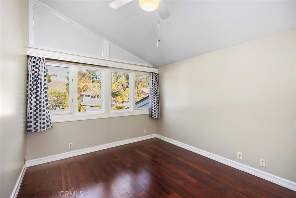 10 Rippling Streme Irvine, CA 92603 - Photo 24 of 31 a view of an empty room with wooden floor and a window