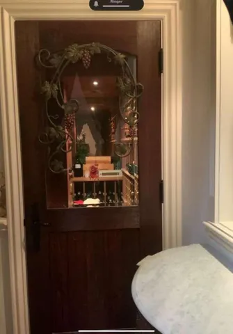 a view of an chairs and table in the balcony