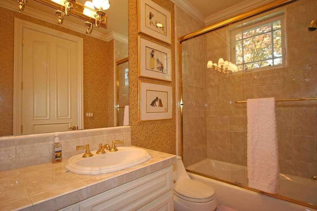 5403 Blackhawk Drive Danville, CA 94506 - Photo 24 of 47 a bathroom with a sink a toilet and shower