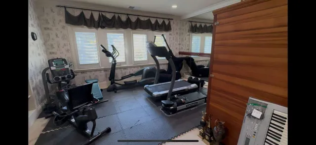 a view of a room with gym equipment