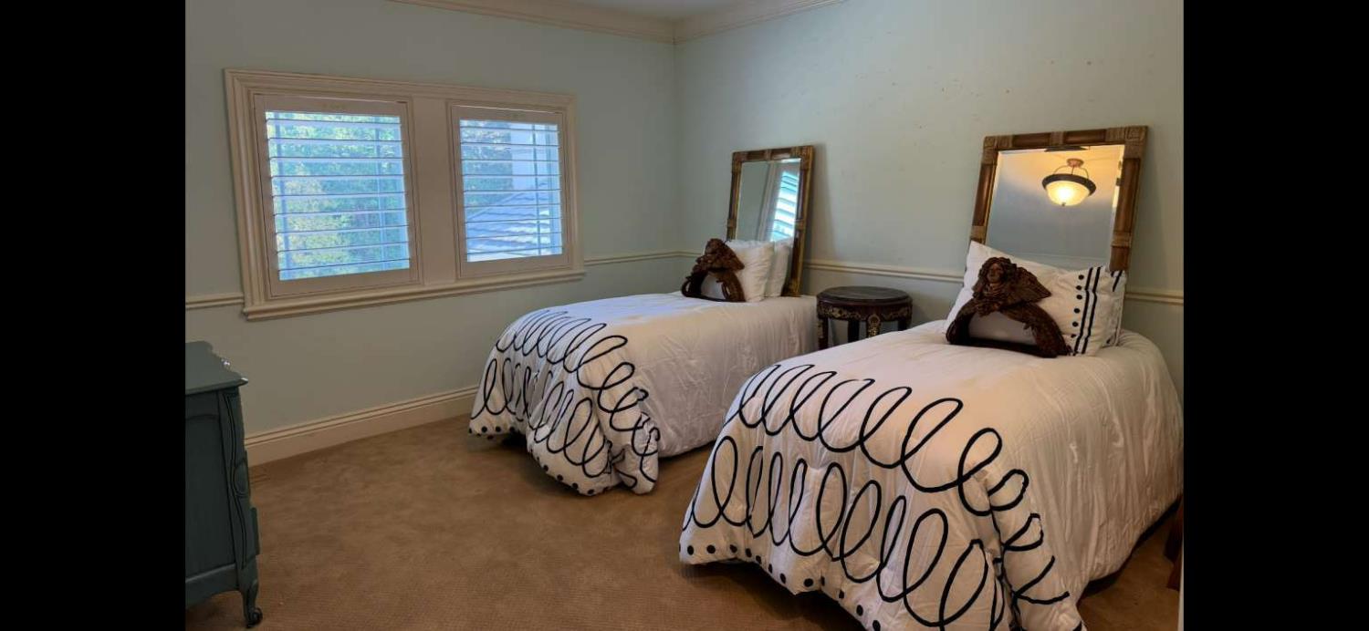 5403 Blackhawk Drive Danville, CA 94506 - Photo 30 of 47 a bedroom with two beds and a window