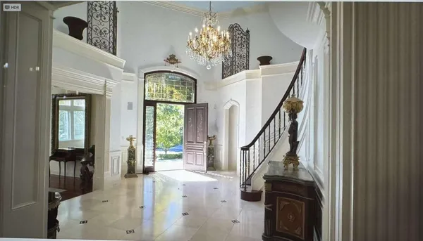 a view of a hallway with windows