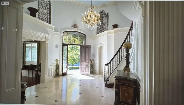 a view of a hallway with windows