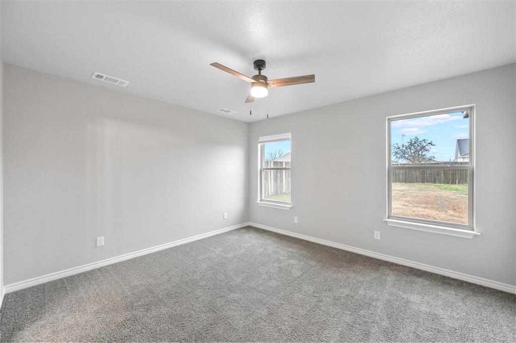 228 St Charles Drive, Unit B Springtown, TX 76082 - Photo 10 of 20 a view of an empty room with a window