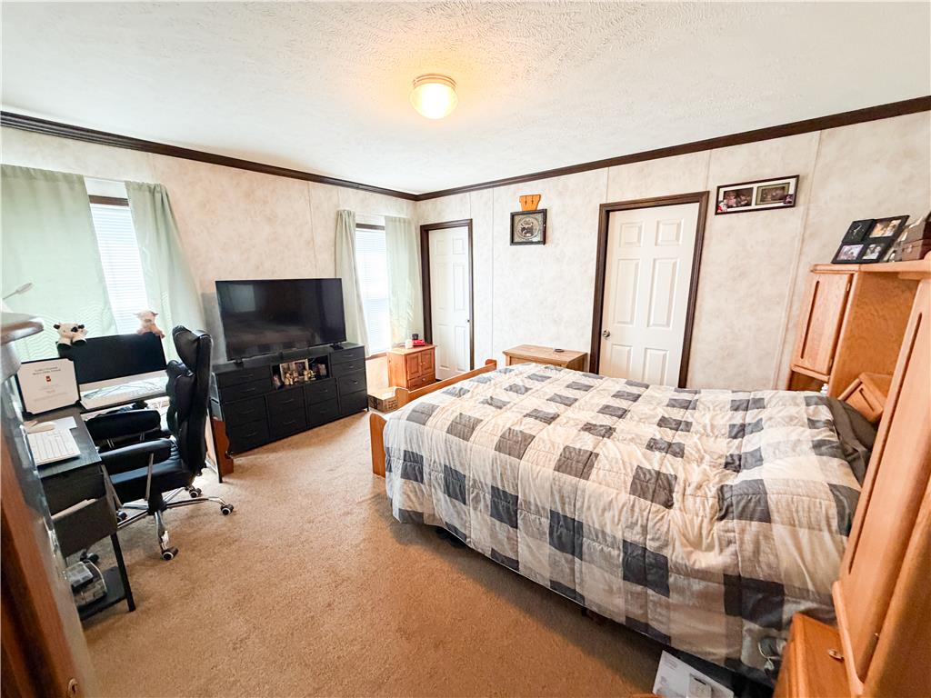 49 Ritz Craft Street Walnutport, PA 18088 - Photo 12 of 17 Well-lit room with ample space for both rest and productivity.