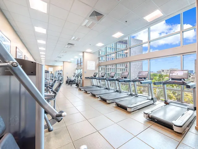 a living room with lots of furniture and a table