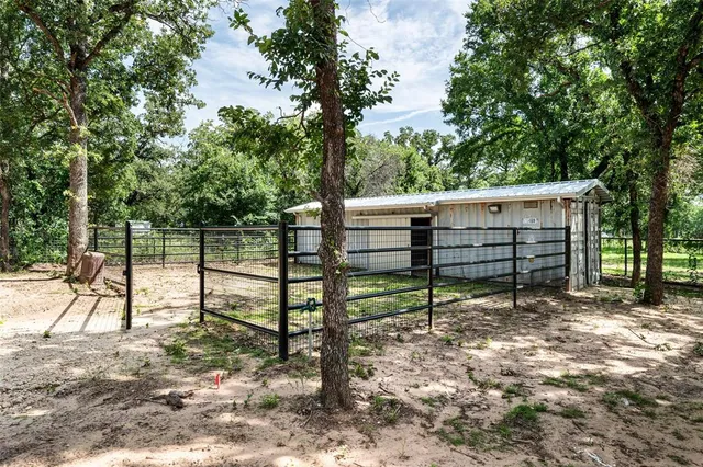 a view of kitchen with cabinets and a wooden floor