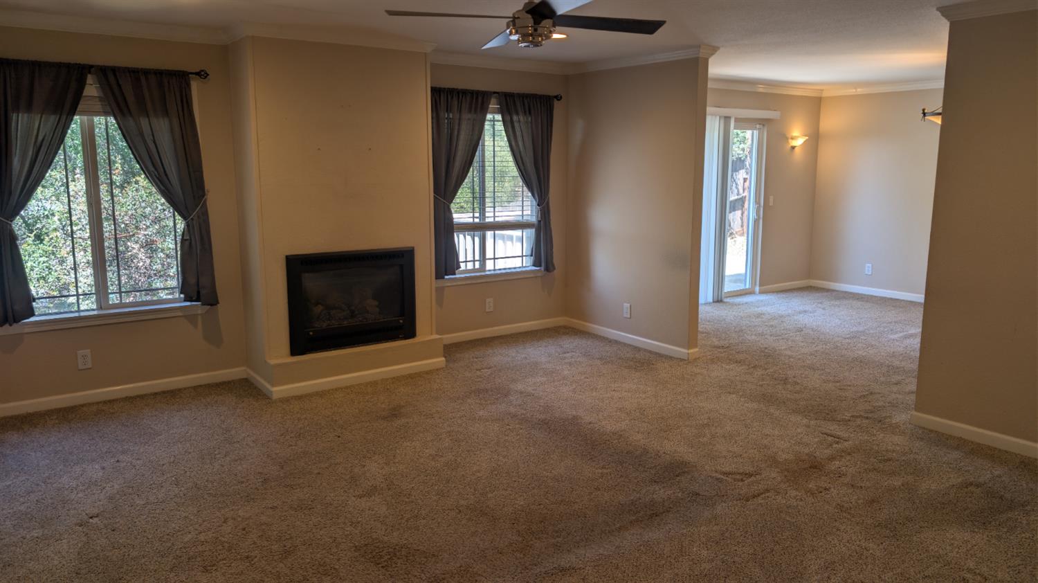 3248 Sudbury Road Cameron Park, CA 95682 - Photo 10 of 41 an empty room that has a window and kitchen view