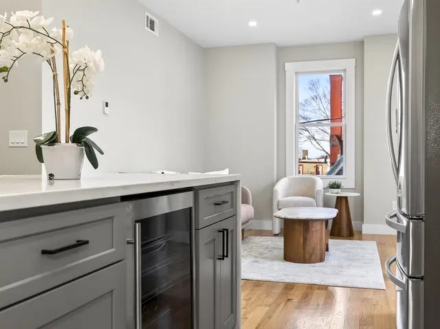a view of bathroom with a sink and a mirror