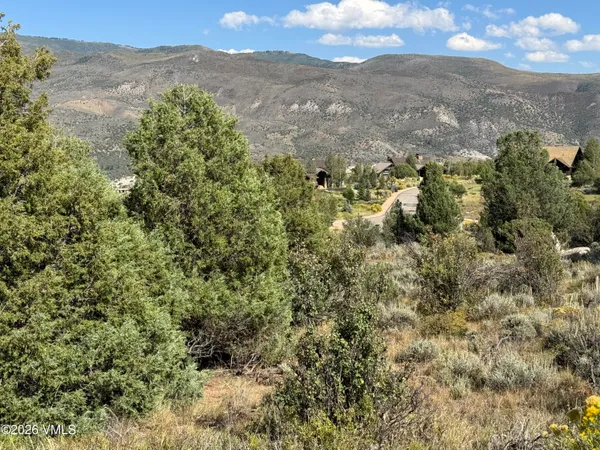 a view of a lake with mountains in the background