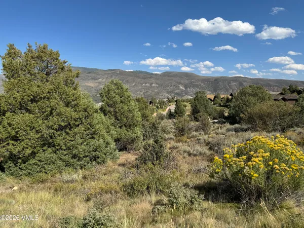 a view of mountain view with mountains in the background
