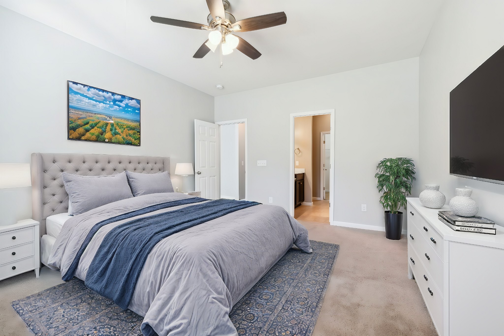 1408 Old Stone Road Lebanon, TN 37087 - Photo 12 of 31 a spacious bedroom with a bed and a flat screen tv