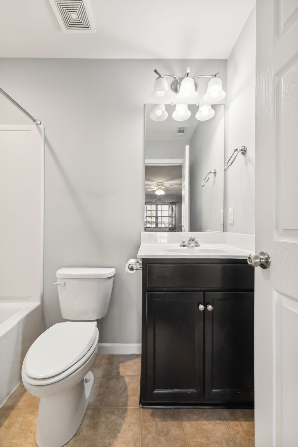 1408 Old Stone Road Lebanon, TN 37087 - Photo 24 of 31 a bathroom with a sink vanity and a toilet