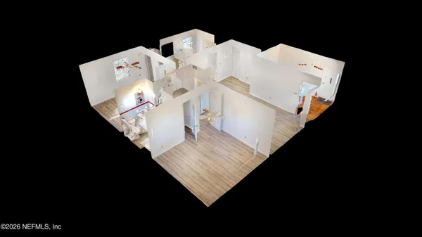 a view of a living room with furniture